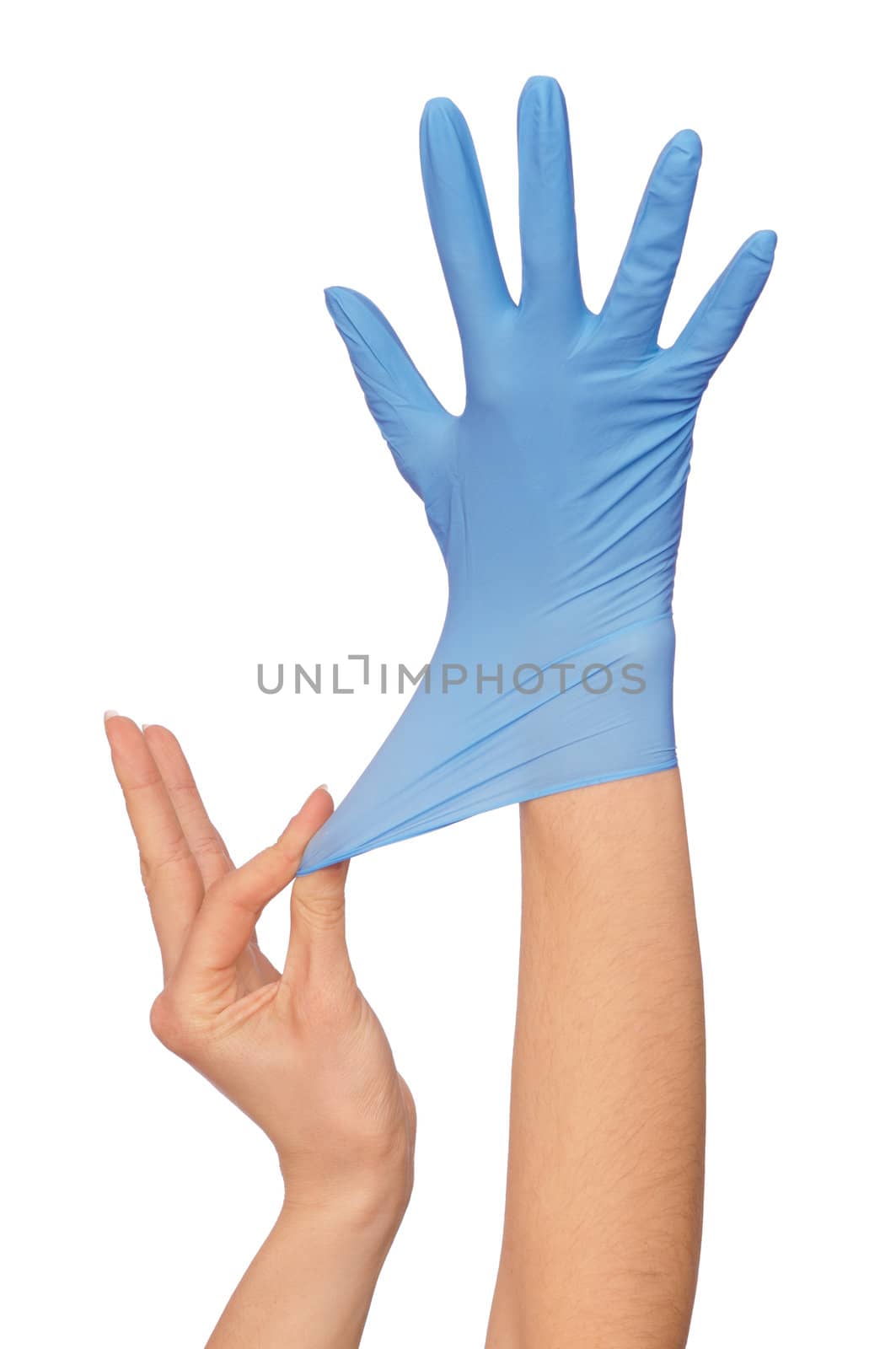 Doctor putting on blue sterilized medical glove for making operation