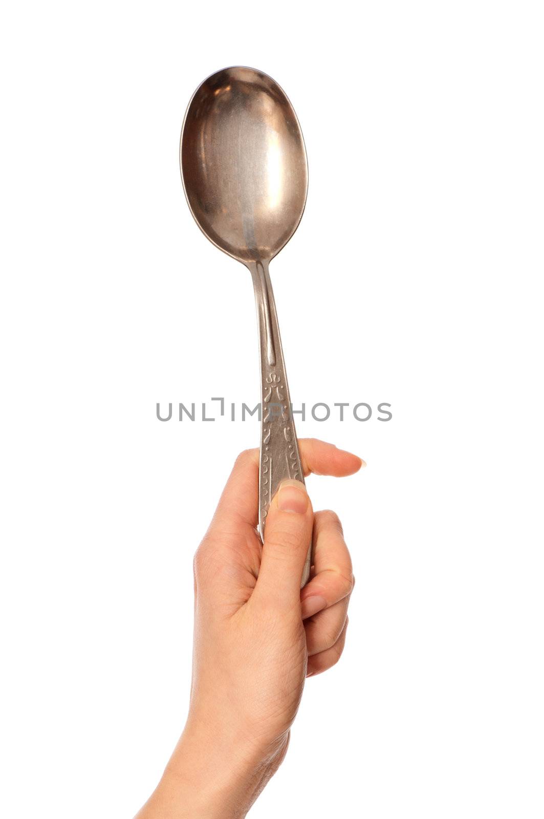 woman holding tablespoon in the hand for feeding a sick person