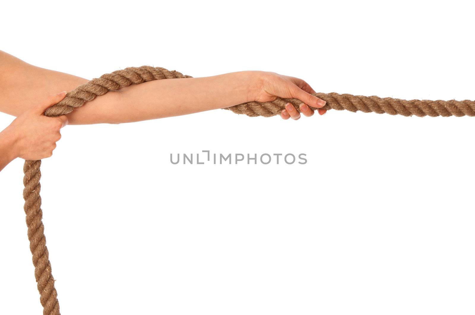 The strong-willed woman plays of pulling of a rope and wins