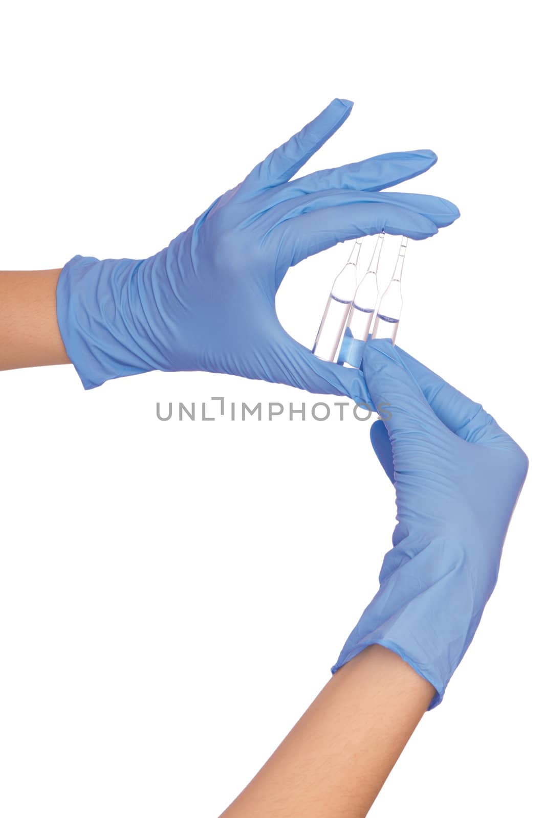 laboratory assistant takes three ampules for making a vaccination