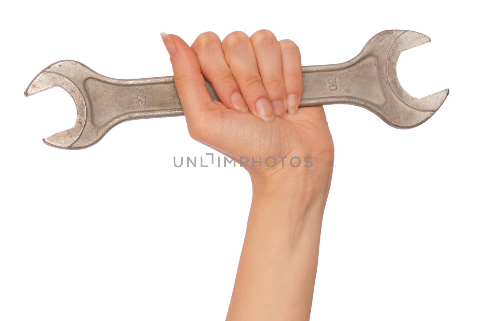 woman holding big chrome vanadium spanner in the hand