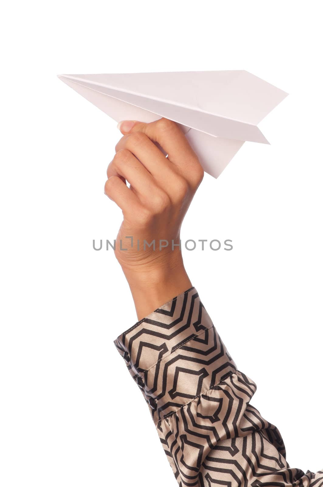 Businesswoman throwing white paper plane on the break