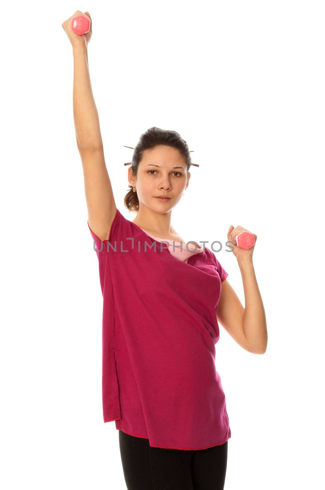 instructor showing to people exercises using dumbbells at gym