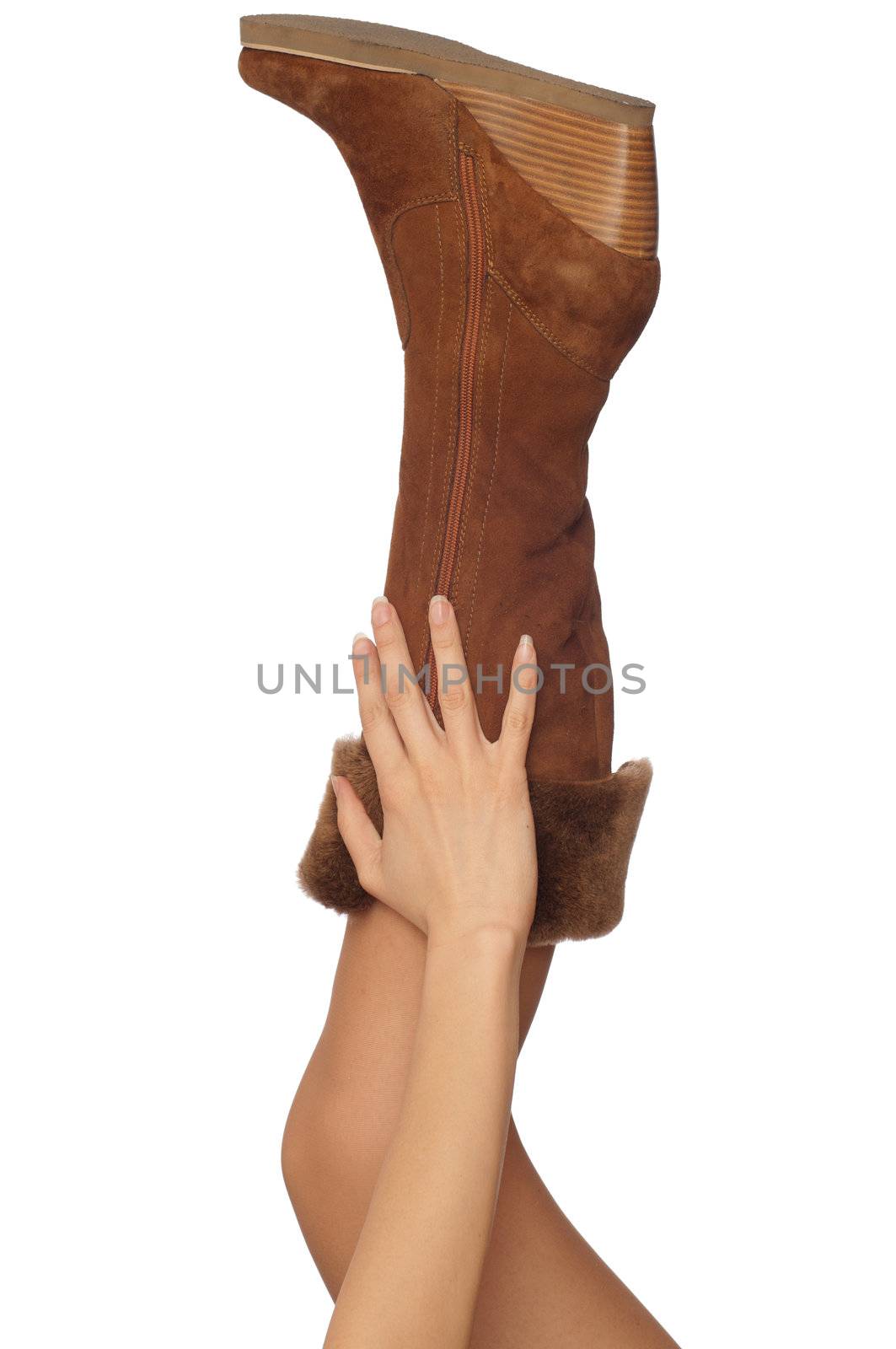 brown leather boots with broken zipper on the leg