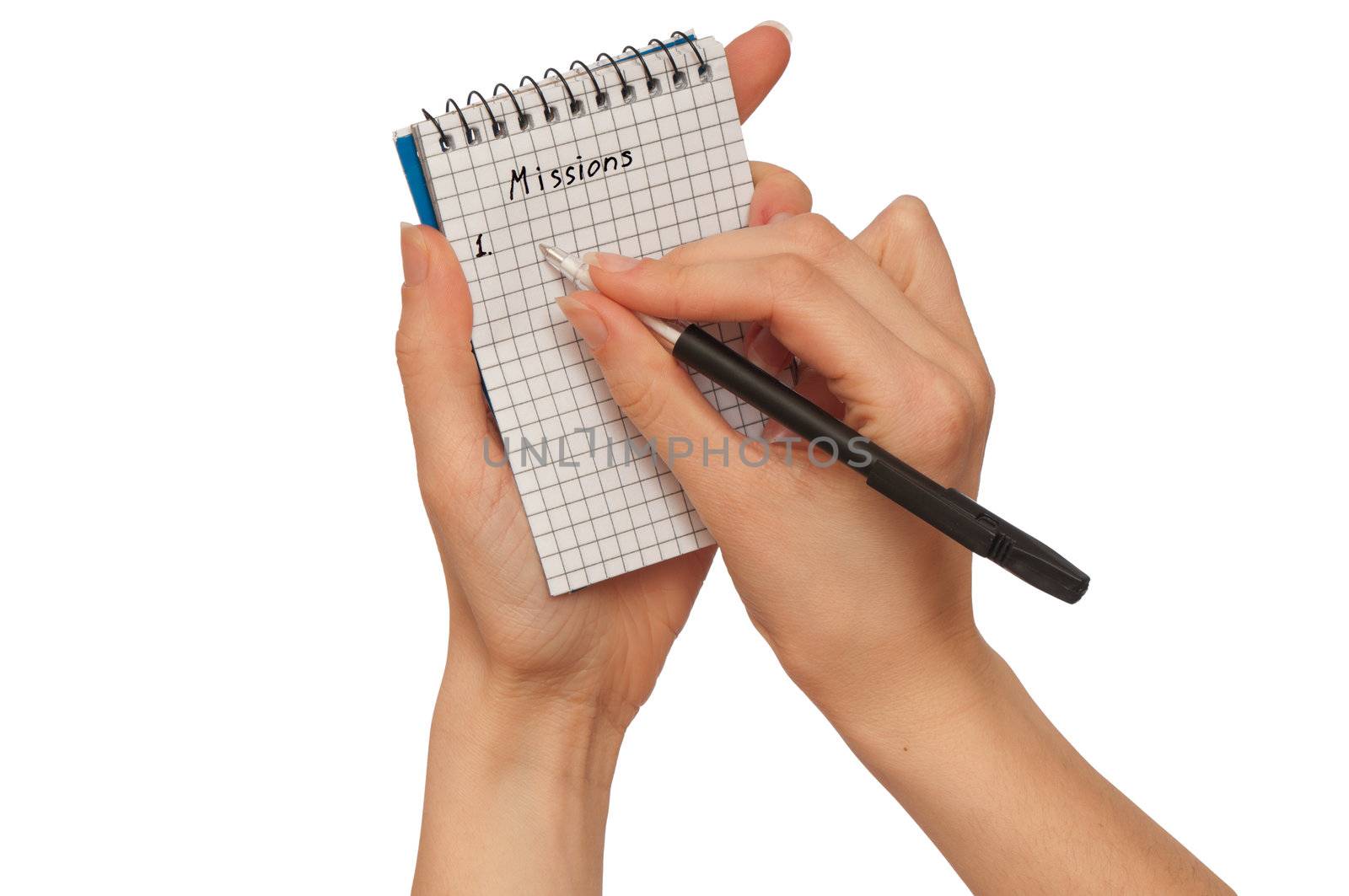 business woman writes mission for business plan