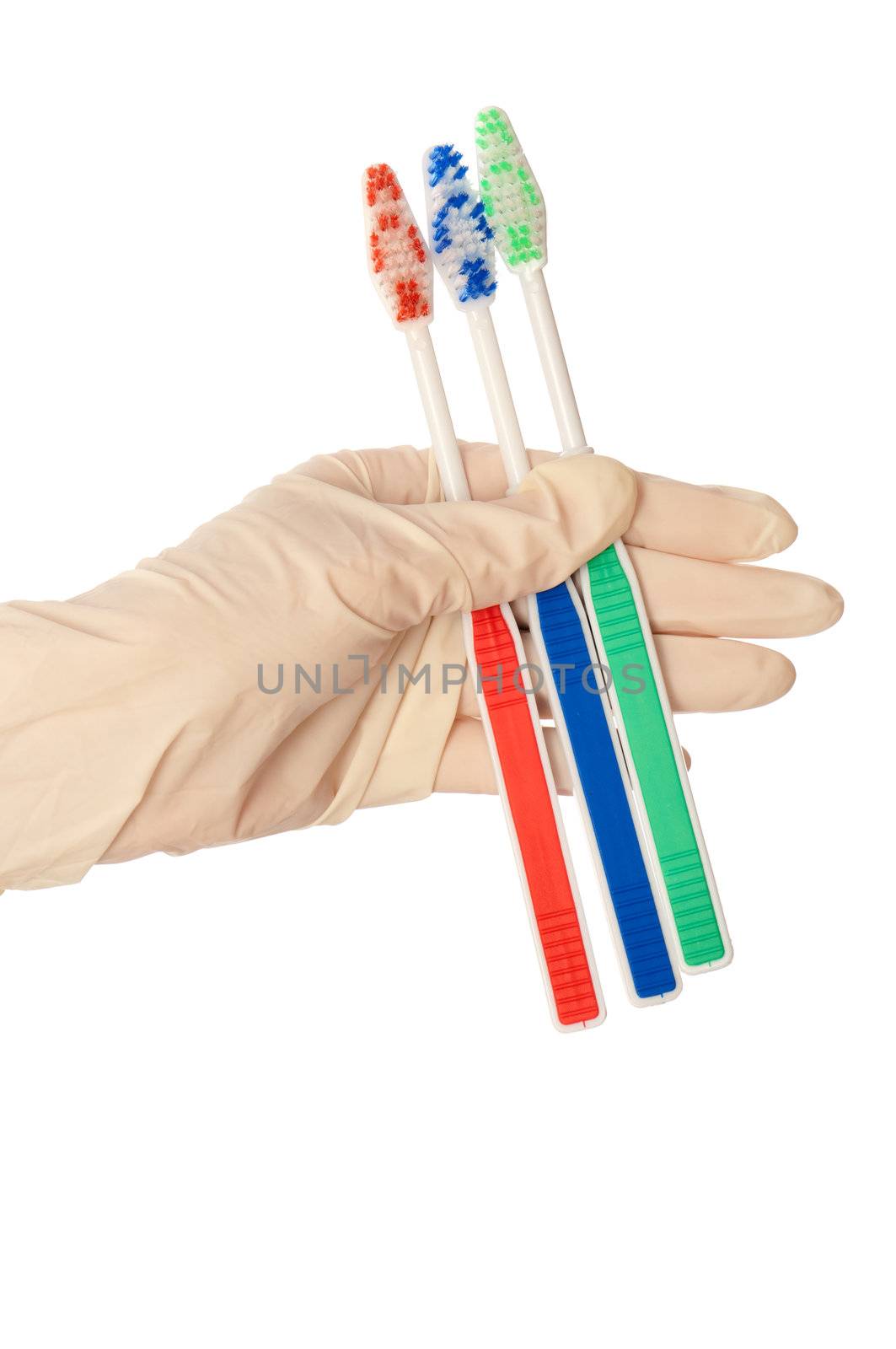 Orthodontist recommends to the patient a suitable toothbrush
