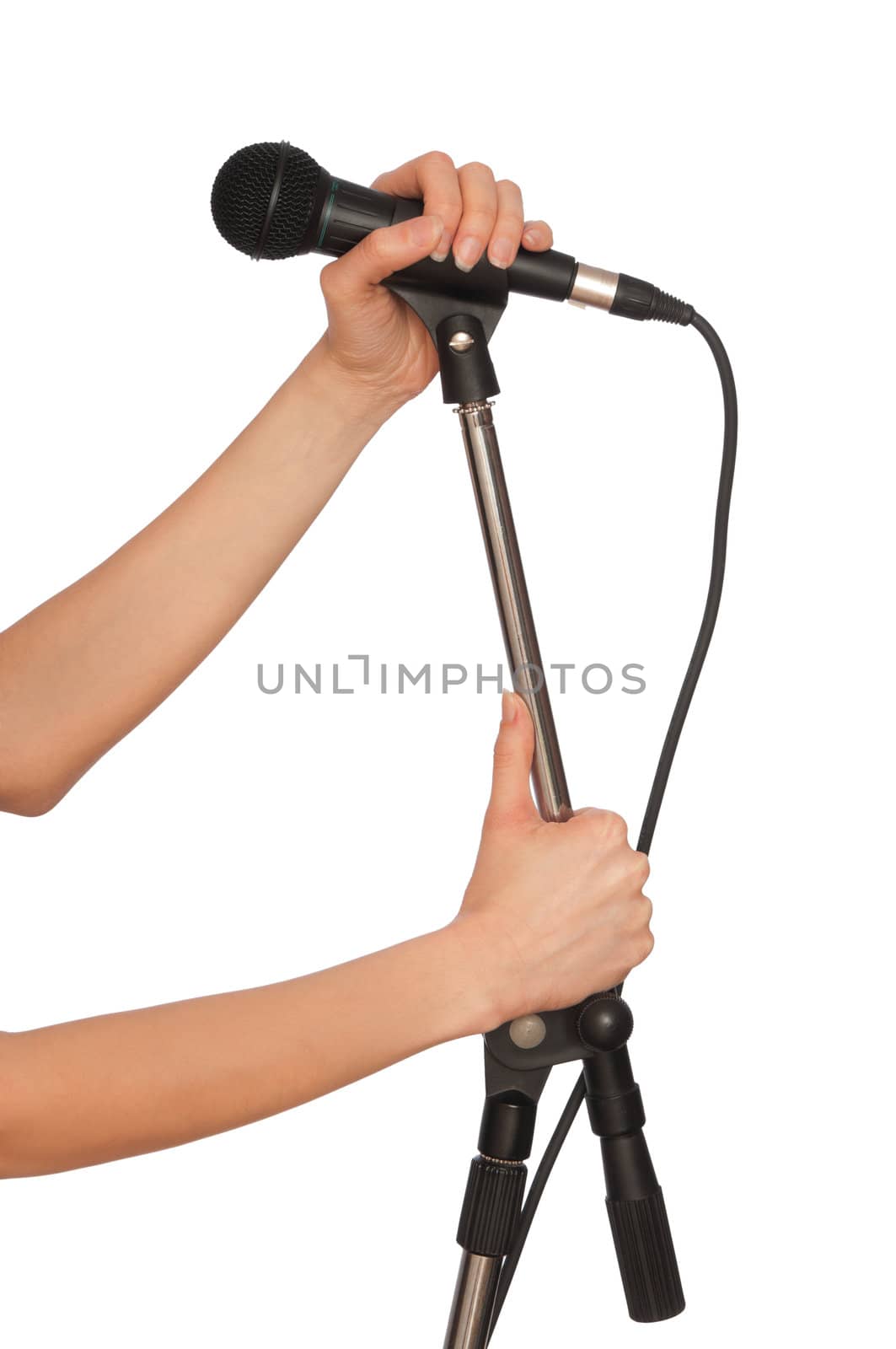 woman holding big black microphone for singing