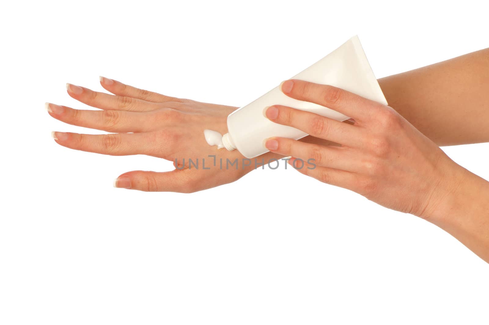 woman lubricates the hands skin with cosmetic cream