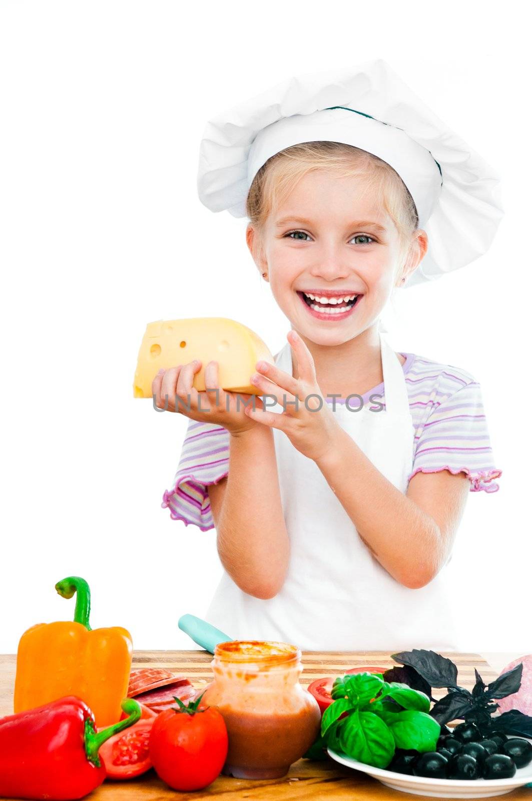 cute little girl little girl holding cheese on a white