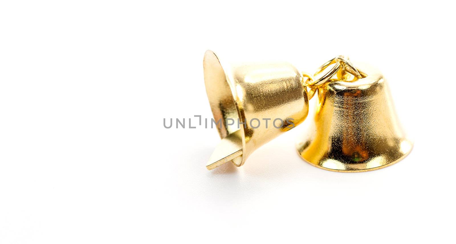 Golden bell isolate on white background