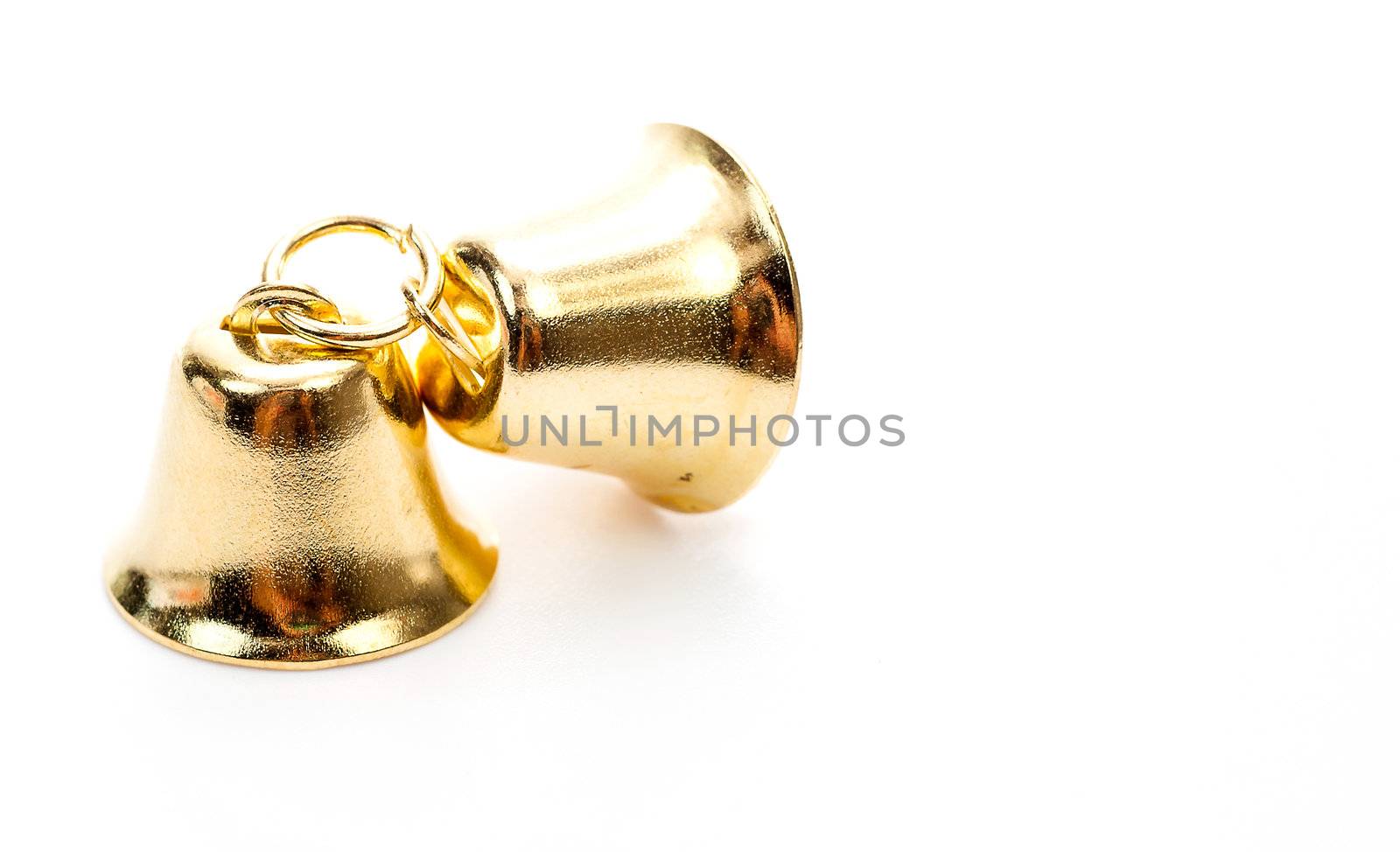 Golden bell isolate on white background