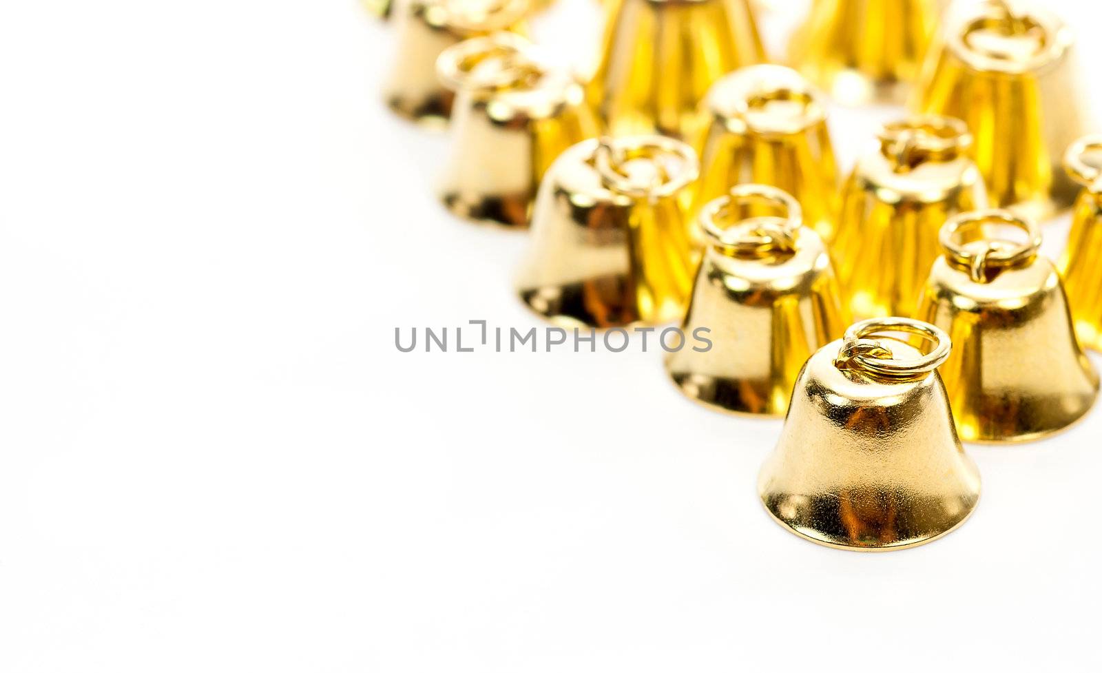 Golden bell isolate on white background