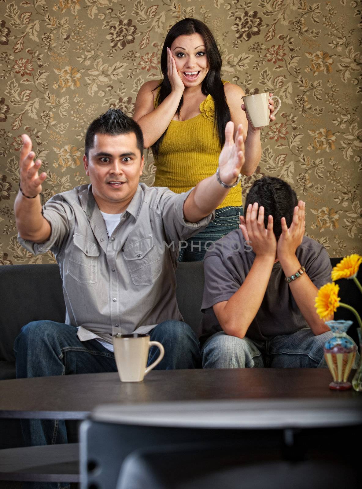 Excited Family Watching TV by Creatista
