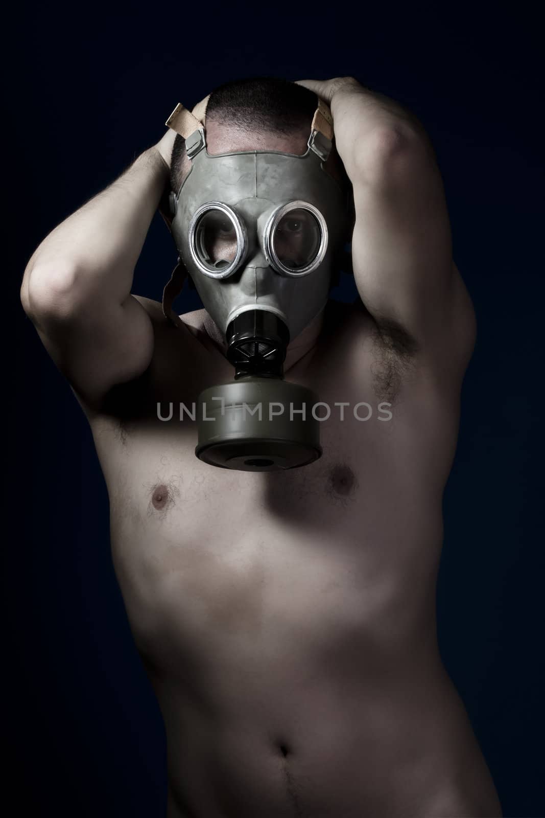 Fear, shirtless man and gas mask