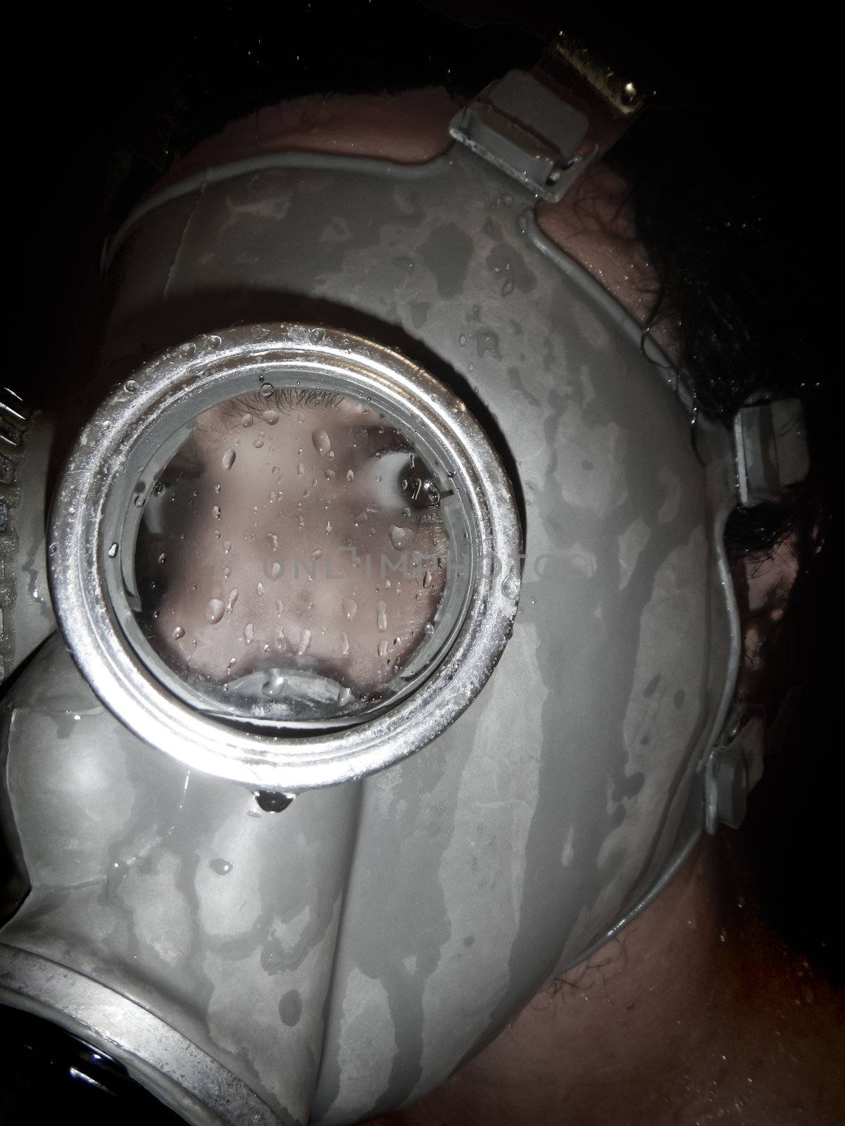Man wear gas mask grunge background