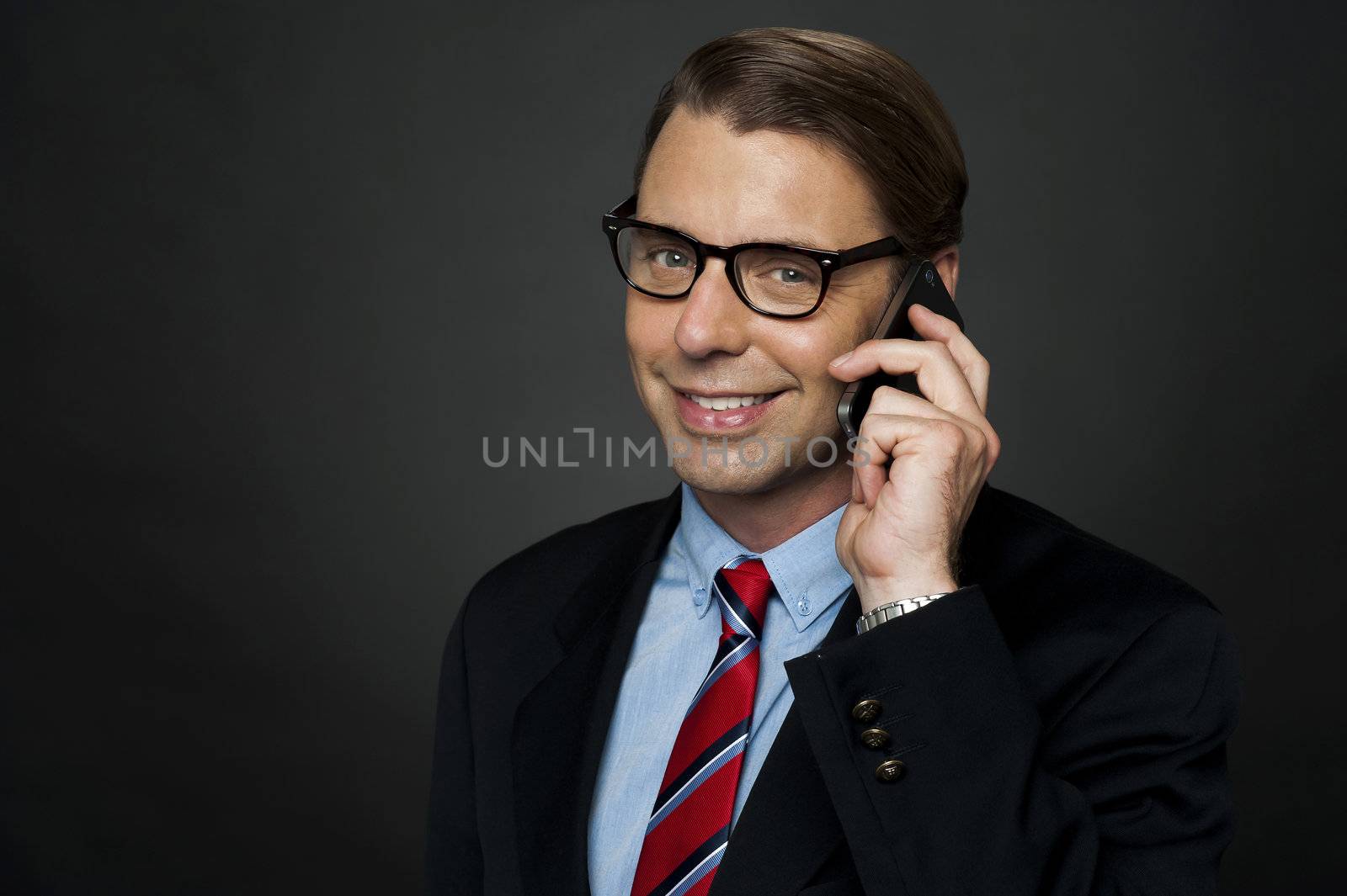 CEO communicating with his business clients over a phone call