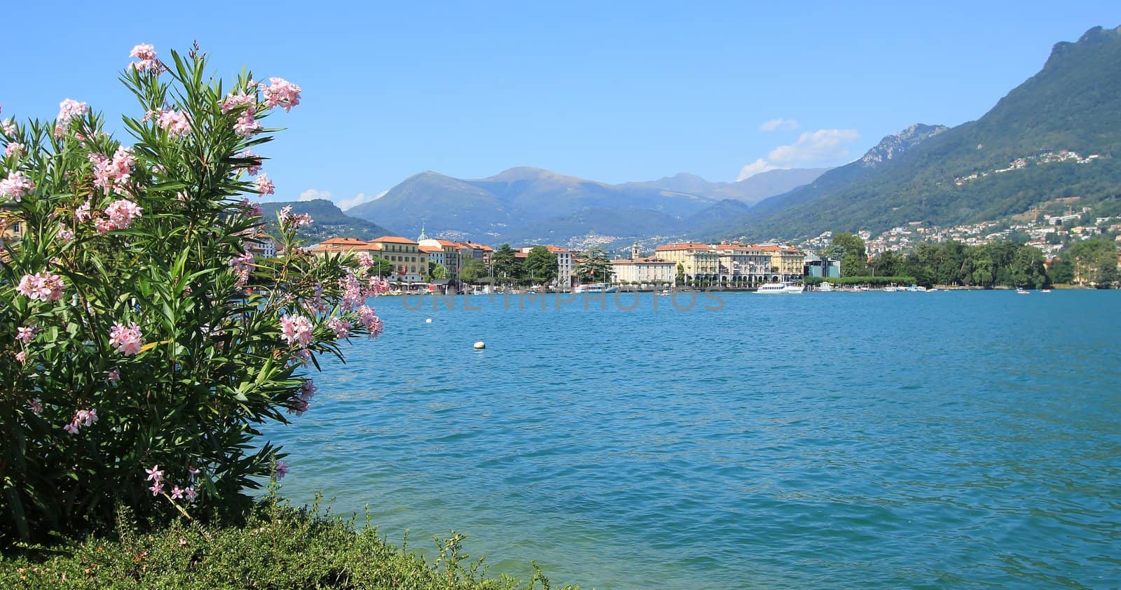 Landscape of Lugano city and lake with alps mountains, Switzerland
