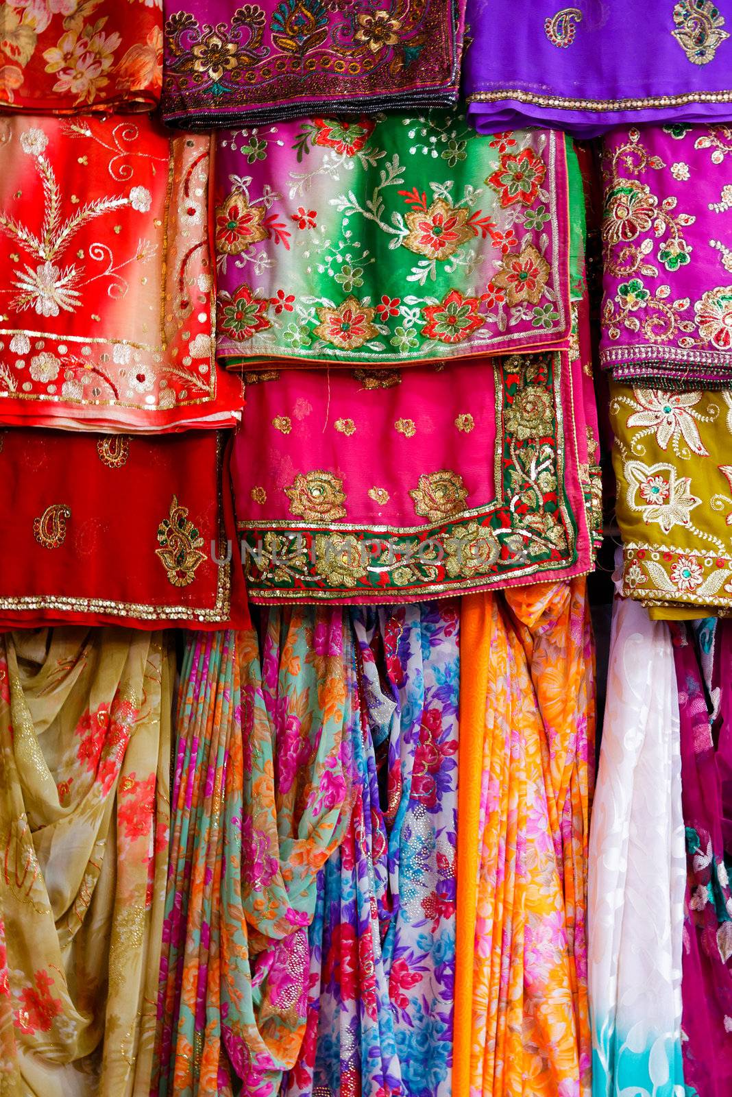Colorful clothes and saris by dutourdumonde