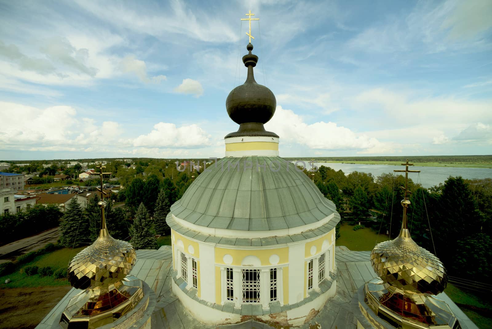 Gilded domes of old church in the settlement Myshkin in Russia.Taken on July 2012.