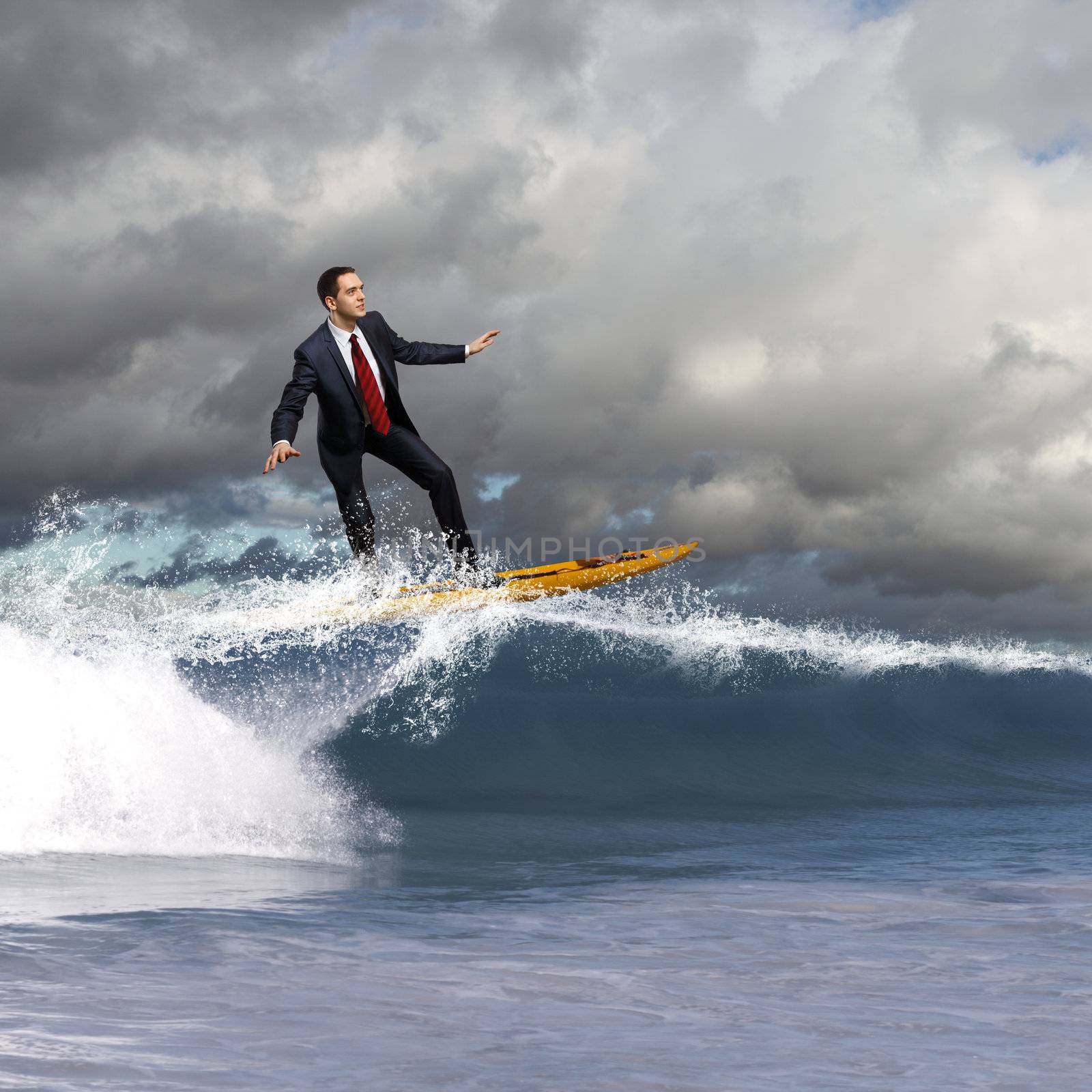 Young business person surfing on the waves by sergey_nivens