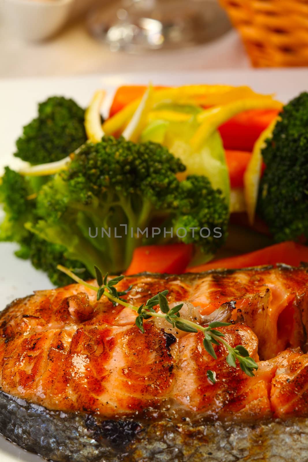 Delicious salmon grilled with brocoli lemon and bread