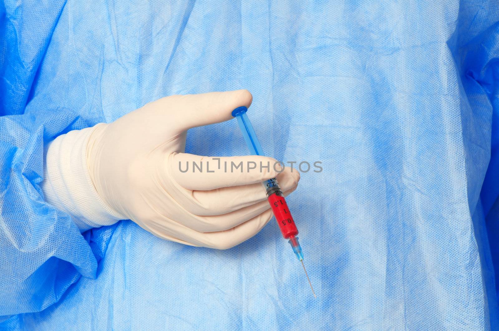 doctor holding a syringe with new synthetic drug mixed with blood