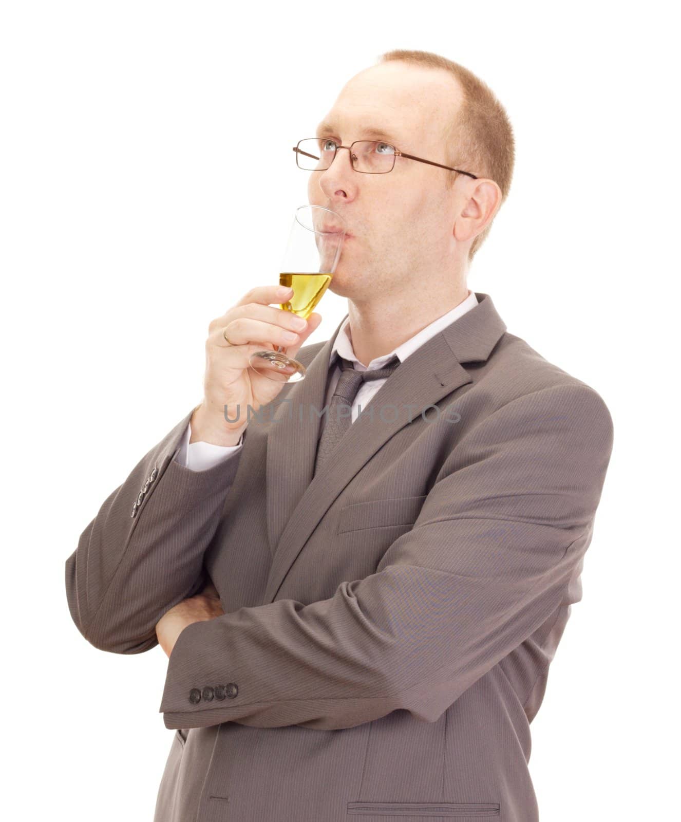 Business person drinking a glass of champagne