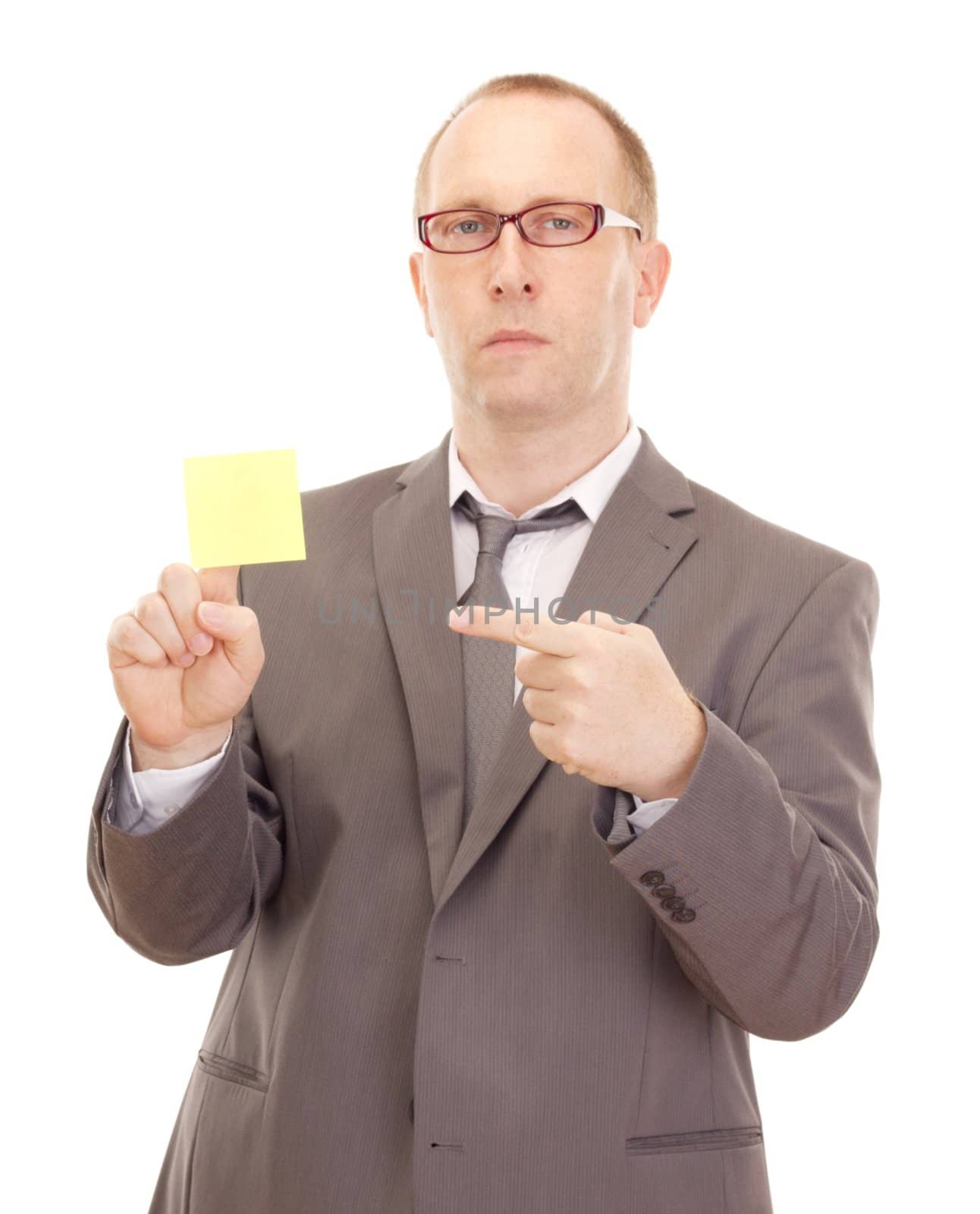Business person showing removable note