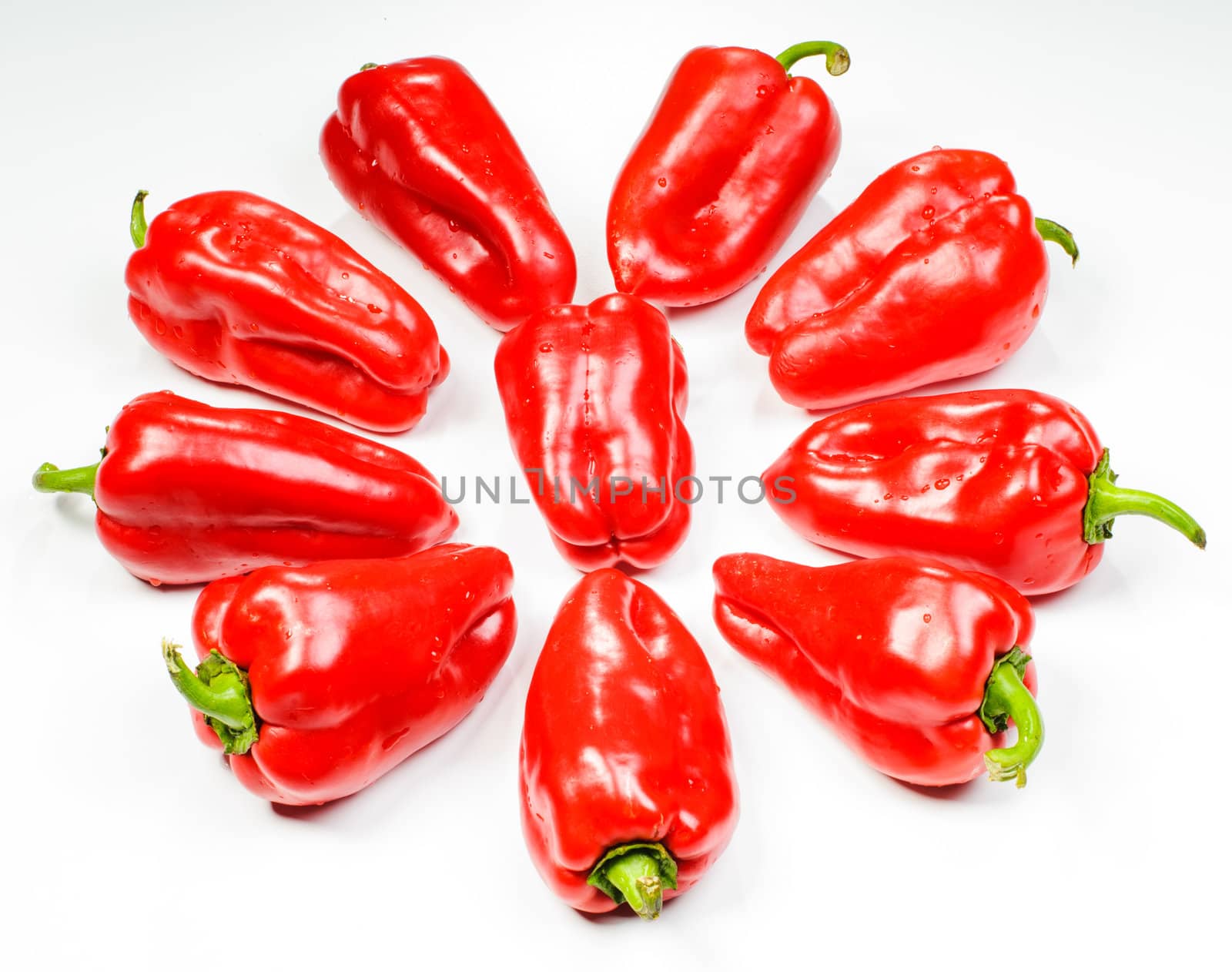 Star made of peppers isolated on white background