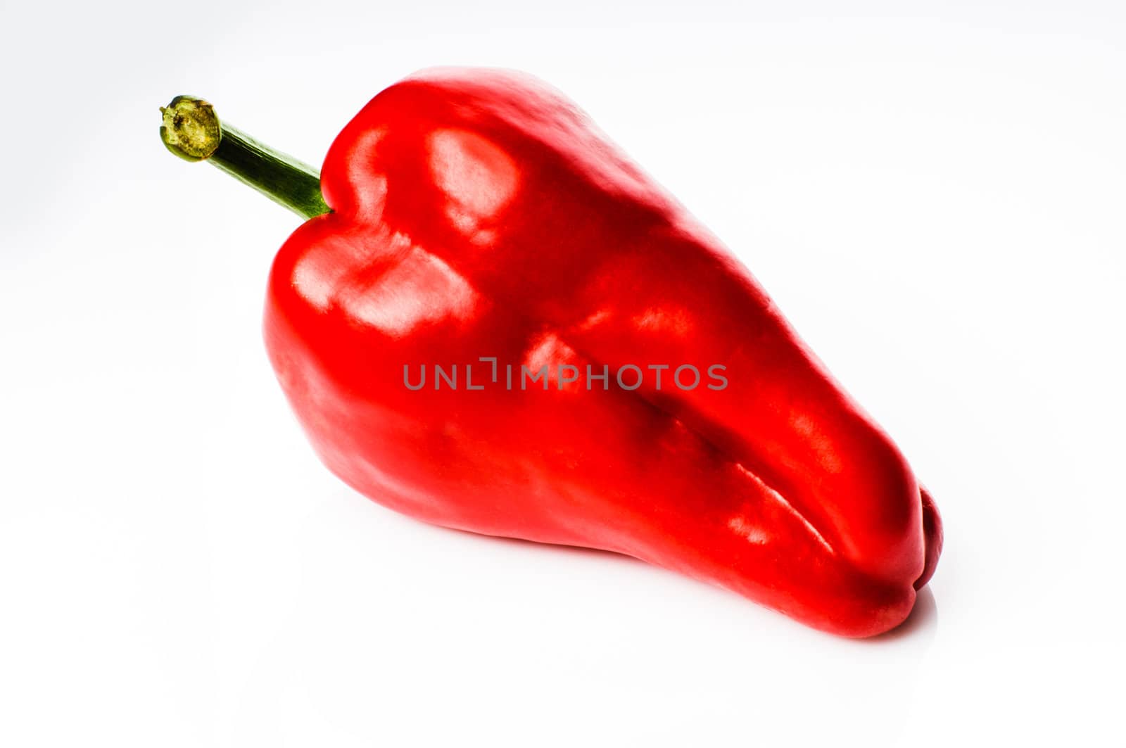 Big red pepper isolated on white background
