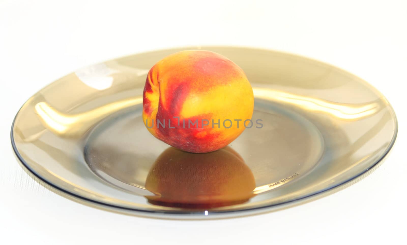 beautiful, delicious peaches  on a light background