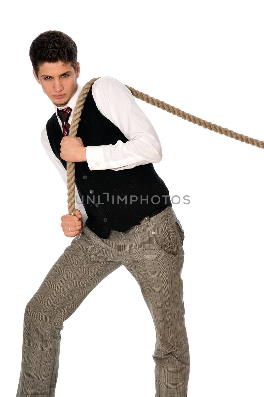 strong-willed man pulling of a rope and wins as a symbol of success