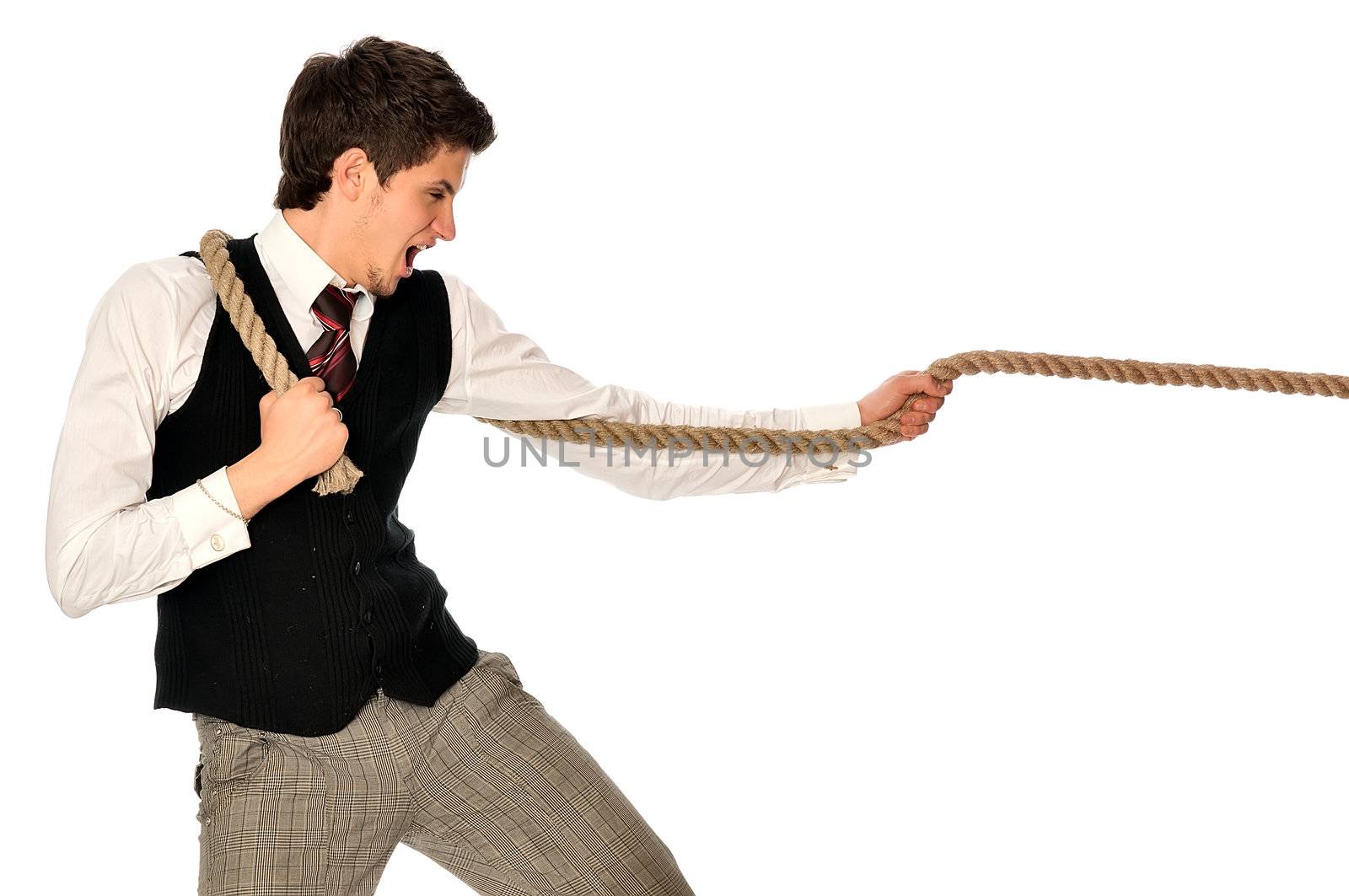 strong-willed man pulling of a rope and wins as a symbol of success