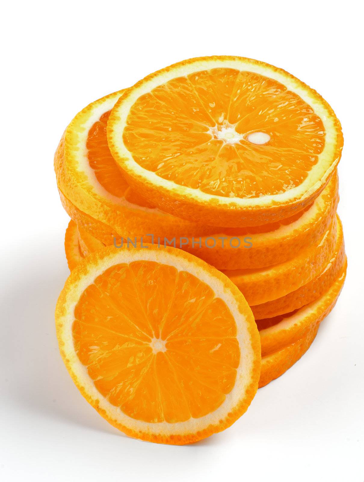 Stack of Fresh Ripe Orange Lobules isolated on white background