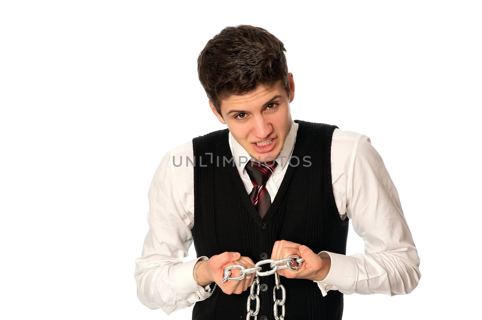 businessman breaking the chain by hands for liberation as a symbol of work captivity