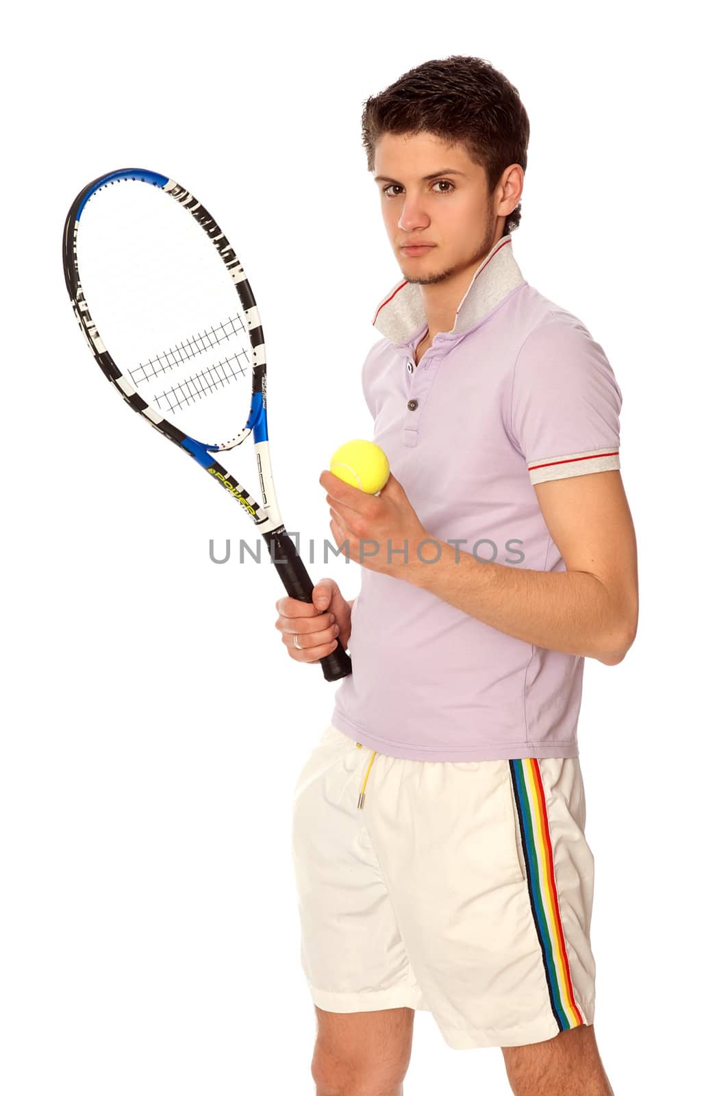 man with racket concentrated on playing tennis and preparing for the ball serving