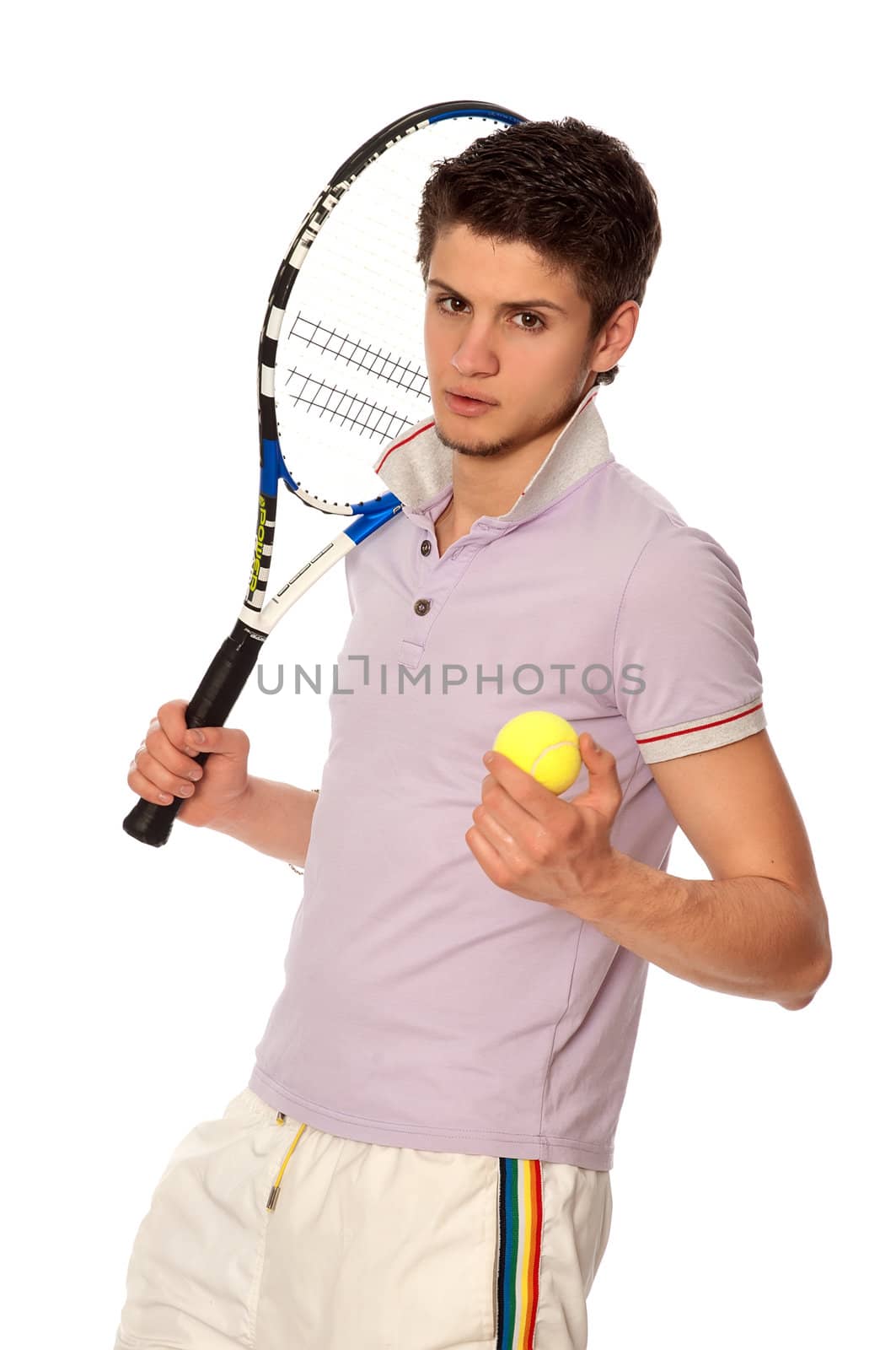 man with racket concentrated on playing tennis and preparing for the ball serving