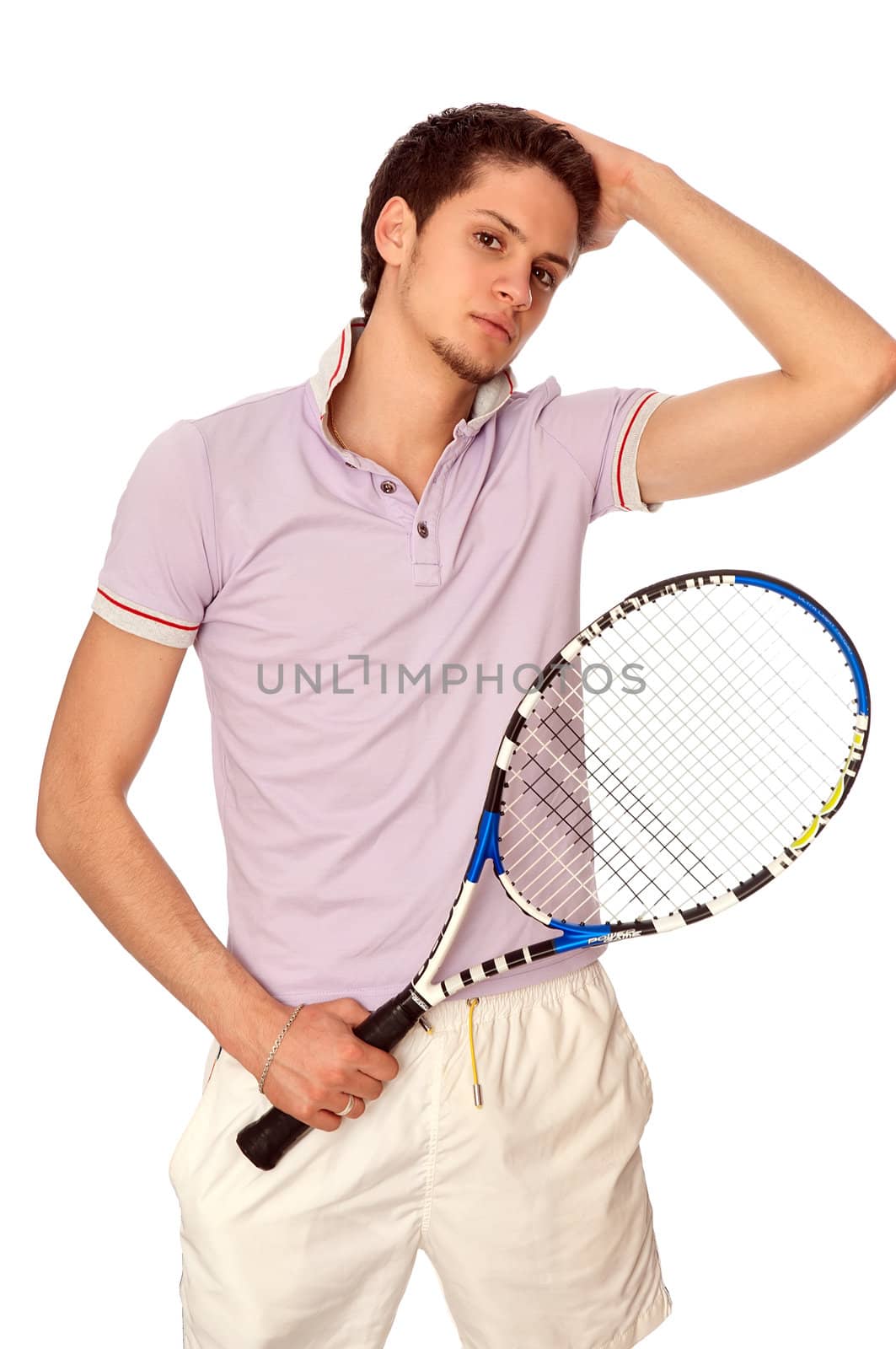 man with racket concentrated on playing tennis and preparing for the ball serving