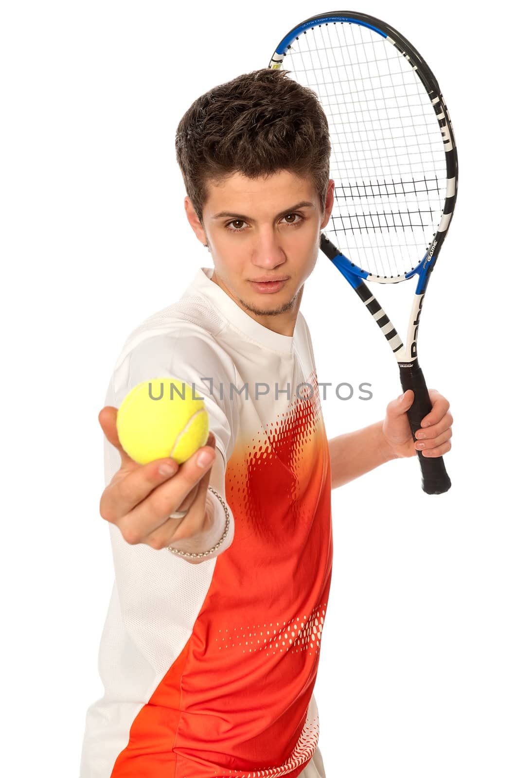 man with racket concentrated on playing tennis and preparing for the ball serving