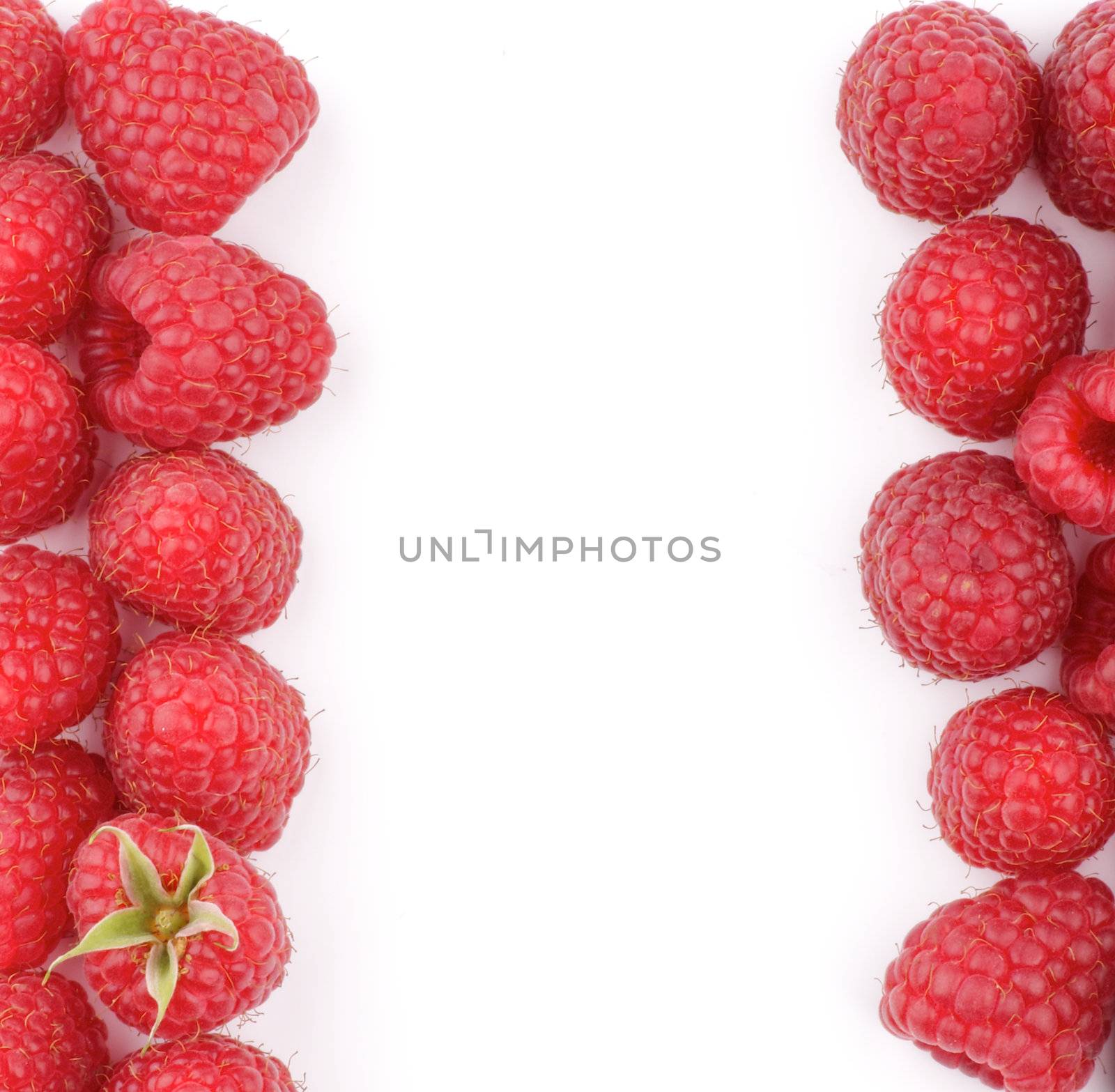 Frame of Perfect Ripe Raspberries isolated on white background