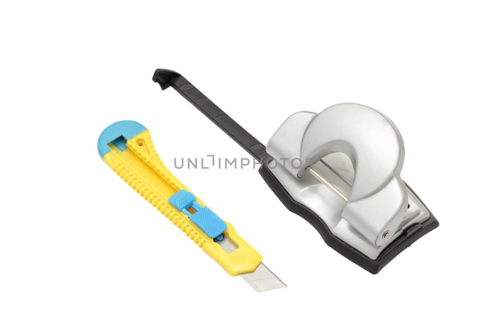 office items isolated on white - blue yellow cutter and gray puncher