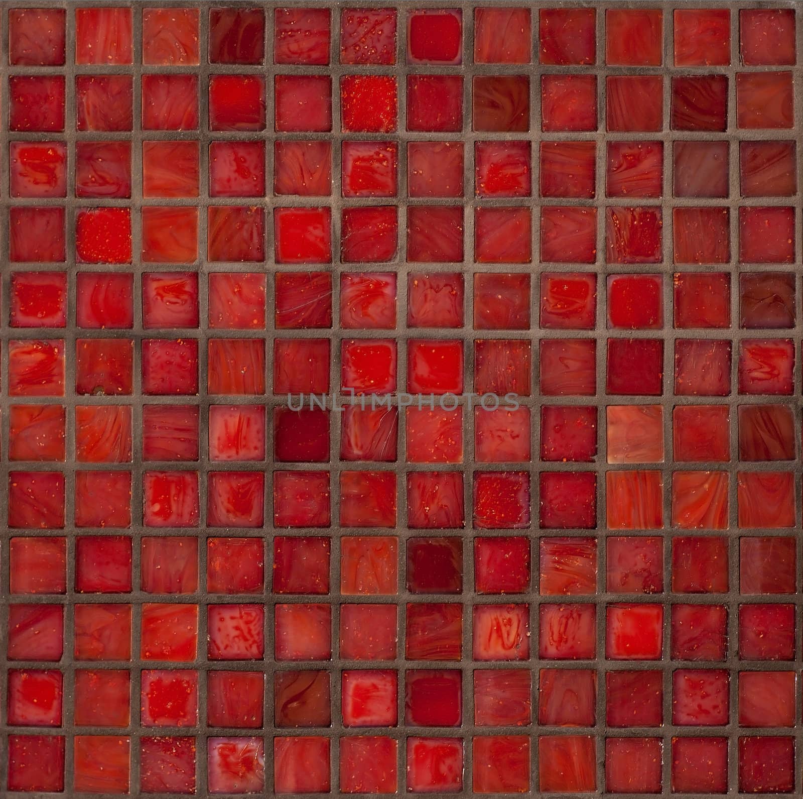 Decorative glass tiles in a bright red small squares