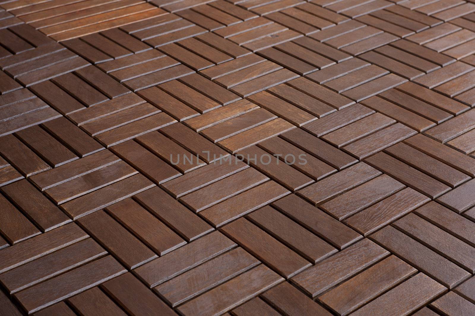 The texture of wooden parquet dark red-brown, varnished