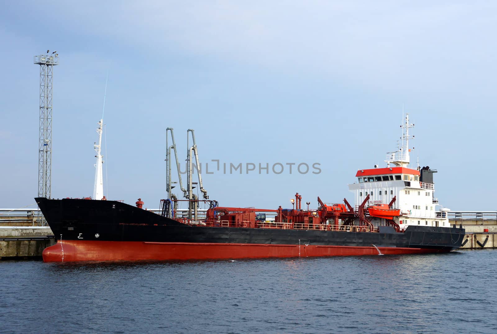 The tanker is moored in the port 