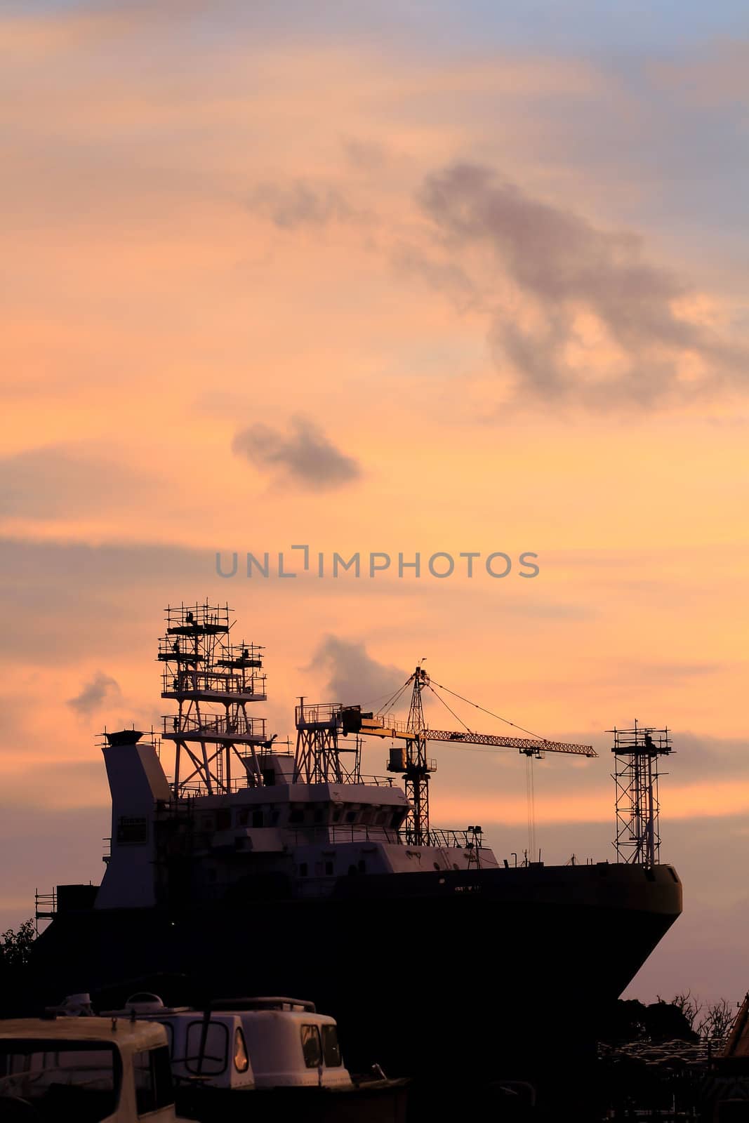 Silhouette of dock- and shipbuilding company at sunset