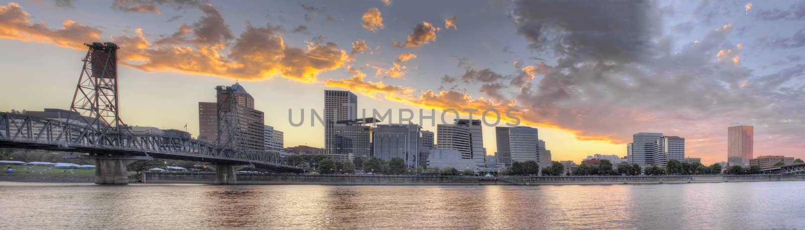 Sunset Over Portland Oregon City Skyline Along Willamette River Waterfront Panorama