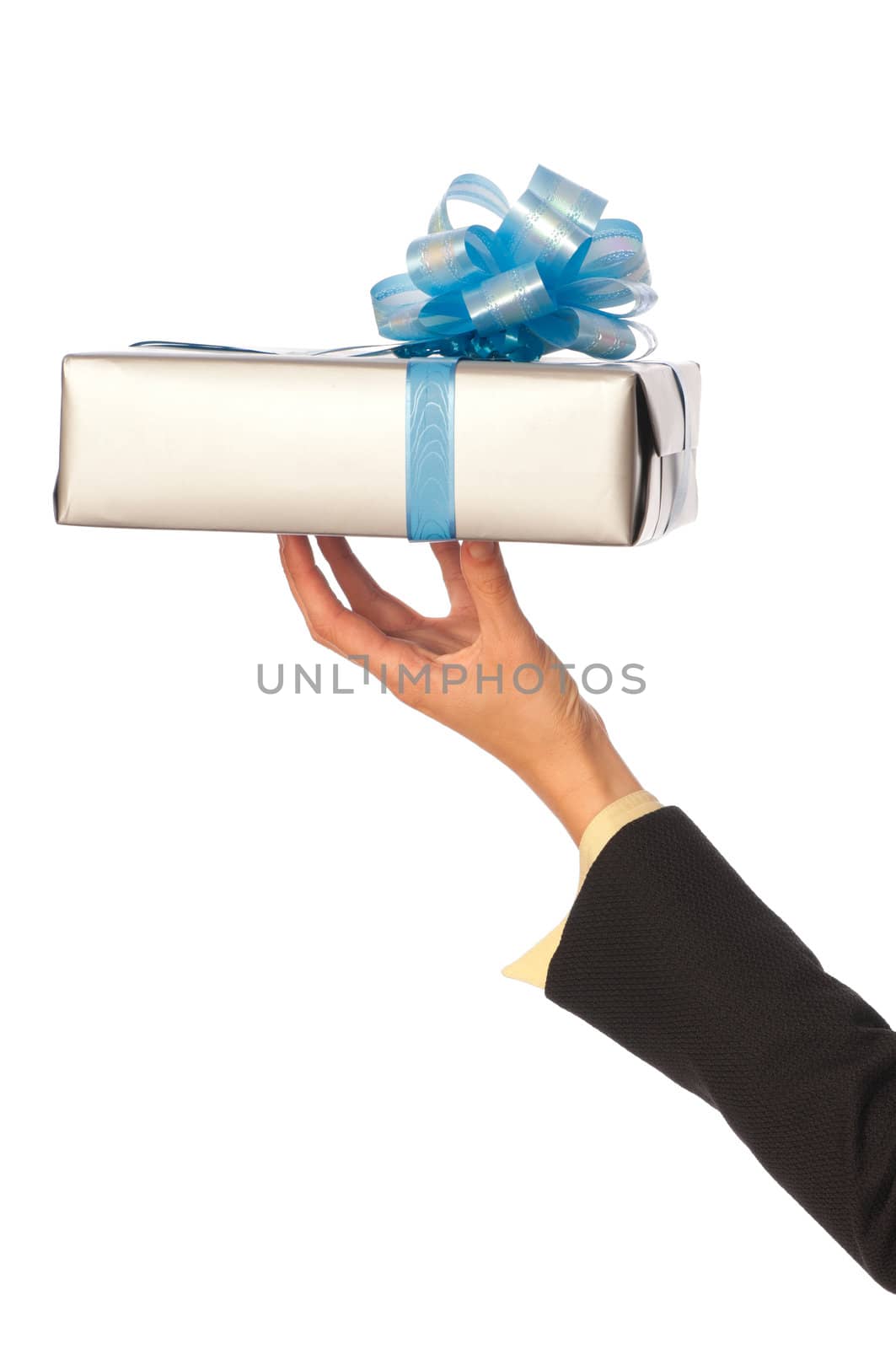 woman giving a silver box with blue bow as a gift
