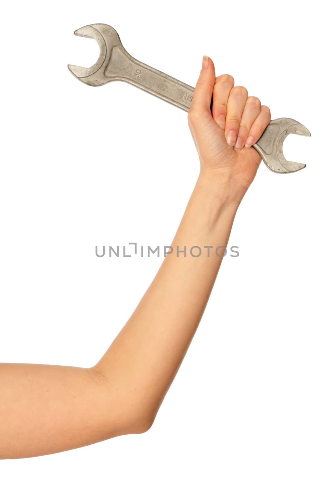woman holding chrome vanadium spanner in the hand