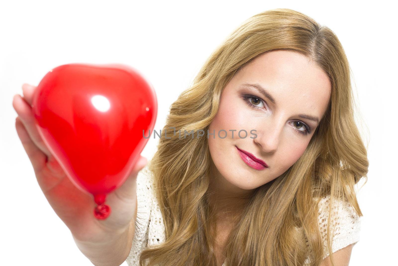 Young woman holding red heart in valentine's day, on white background