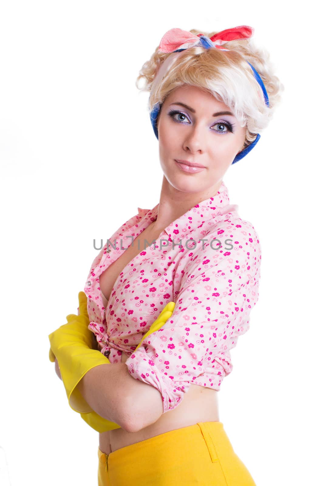 Pinup styled housewife in gloves over white